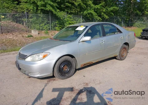2003 Toyota Camry Le z USA, uszkodzony, nr VIN JTDBE32K330175311